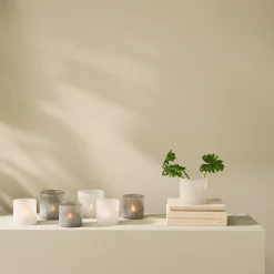 Ljuslykta i frostat glas, vit