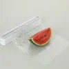 Plastfoliedispenser med skärare