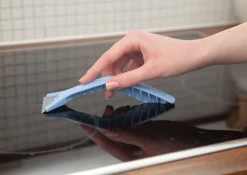 Sini hällsskrapa för glasytor